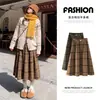 Saia feminina de lã xadrez, inverno retrô de cintura alta, saia rodada, saia em A forrada com fleece, saia de comprimento médio com um visual sofisticado