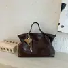 Bolsa tote de grande capacidade para o dia a dia, modelo novo outono 2026, bolsa de ombro com textura de alta qualidade, moderna e versátil