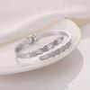 Pulseira de moda estilo concha osso de cobra transfronteiriça pulseira aberta de aço titânio feminina elegante estilo frio joia personalizada