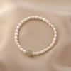 Pulsera de perlas de agua dulce de color morado suave y ligero, diseño de nicho, pulsera de perlas de alta calidad, oro de 14 quilates, pulsera sencilla que combina con todo.