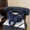 Bolsa Pequena Versátil de Alta Qualidade para Travessia de Fronteira de Grande Capacidade Novo Estilo Primavera 2026 Bolsa de Ombro Único para Axila Feminina Bolsa Transversal de Bolinho