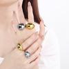 Anillo abierto de acero inoxidable con forma de gota de agua y incrustaciones de diamantes lisos de moda transfronteriza, anillo de joyería de moda de alta gama que combina con todo para mujer