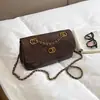 Bolso cuadrado pequeño de punto de cruz para mujer 2026 nuevo elegante versátil bolso de cadena diseño de nicho bolso de hombro único bandolera simple