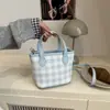 Bolso de mano a cuadros de bloques de color retro estilo coreano para mujer, nuevo de moda de verano 2026, bolso versátil casual de hombro y cruzado