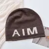 Gorro de Lana Mixta para Adultos, Estilo Igual para Pareja Aim Entity, con Protección para las Orejas, Casual Neutro con Bordes Ligeramente Enrollados