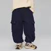 Inverno 2025 Novas Roupas Infantis Calças de Moletom Largas com Forro de Lã para Crianças Maiores Calças Cargo Casuais Engrossadas Tendência