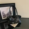 Bolso tote de alta gama, estilo vintage, para mujer, nueva colección 2026, diseño de otoño moderno, bolso de hombro exquisito y de gran capacidad