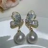 Pendientes de Mariposa de Cristal para Mujer Pendientes de Perlas Barrocas de Alta Gama Pendientes Retro de Aguja de Plata Transfronterizos Europeos y Americanos Venta al por Mayor