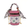 Bolso Transfronterizo para Niños Otoño e Invierno Nuevo Moda Europea y Americana Letra Mini Bolso Cilindro Exquisito Bolso Cruzado de Cadena para Niñas Moderno