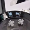 Exquisitos y compactos pendientes de pétalos geométricos de circón para mujer, estilo coreano, elegantes y modernos, pendientes versátiles con un diseño único