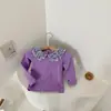 Ropa infantil coreana colección primavera 2026 camiseta para niñas con cuello de muñeca floral, top dulce de manga larga para niños