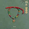 Pulseira de corda colorida zongzi do Festival do Barco-Dragão 2026 novo modelo pulseira trançada artesanal étnica infantil atacado corda vermelha