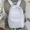 Mochila Minimalista de Luz Suave Estética Estilo Coreano Moderna Suave Aclarante de Piel Femenina Versátil para Clase y Compras Mochila de Almacenamiento