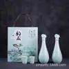 Botella de vino de cerámica 1 Jin tallada Xiangyun olla de vino rima Xizang tipo calabaza botella de vino sellada jarra de vino pequeña para el hogar