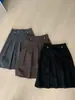Falda midi de punto gris de moda para mujer, nueva colección otoño/invierno 2026, de cintura alta, falda plisada de línea A