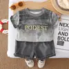 Conjunto de Ropa de Verano para Niños 2026 Nuevo Estilo Verano Niños Bebé Ropa Elegante Manga Corta Pantalones Cortos Conjunto de Dos Piezas Moda Dropshipping