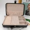 Almacenamiento de Escritorio Caja de Joyería de Cuero de Gama Alta Nueva de Gran Capacidad Portátil para Anillos Pendientes Uñas Joyería Lg7234