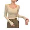 Al por mayor transfronterizo coreano otoño e invierno estilo extranjero cuello en V ajustado Joker manga larga camiseta suéter interior elegante top para mujer