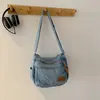 Textura versátil, diseño de nicho, bolso de mezclilla lavado de moda, nuevo modelo 2026, bolso de hombro/cruzado simple y elegante