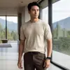 Camiseta de imitación de alta calidad 100% cachemir puro, cuello redondo, manga corta, tejido de punto fino para primavera y otoño, base para negocios
