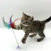 Juguete para gato resorte ventosa palo para gato pluma columpio elástico con sonido campana juguete para gato de hi wholesale