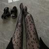 Medias de red huecas con diseño de calavera y telaraña para celebrar Halloween en Internet, medias de seda blancas puras, medias de seda negras sexys.