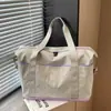 Bolsa de viaje de gran capacidad para mujer, ligera y adecuada para viajes cortos, con compartimentos separados para artículos húmedos y secos, un diseño elegante e ideal para el gimnasio.