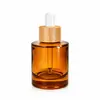 Stock Listo del Fabricante 50ml100ml Botella Cilíndrica de Fondo Grueso Botella para Sub-Embotellado de Cosméticos Esencia de Rocío Puro Hidratante