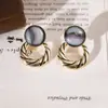 Pendientes Geométricos Huecos de Piedra Ojo de Gato Círculo Aguja de Plata Moda Versátiles de Nicho Pendientes Elegantes Pendientes con Sentido de Diseño de Personalidad