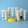 Crema para el cuello de 50g con aplicador roller y varios cabezales de masaje, materiales de empaque cosmético, envase de tubo de plástico, venta directa desde la fábrica de origen