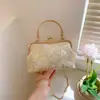 Produto transfronteiriço recém-lançado: Bolsa estilo cheongsam chinês, bolsa de noite, bolsa de mão, bolsa transversal, bolsa requintada de alta qualidade três em um