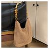 Bolsa de tecido casual de grande capacidade transfronteiriça Nova bolsa de ombro oca tecida à mão Bolsa de praia de férias Bolsa feminina para todos os jogos