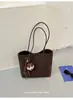 Elegante y sofisticado bolso de mano para mujer, nueva colección 2026, con material de gamuza con efecto Maillard, un bolso tote de gran capacidad y diseño de bolso tipo cubo