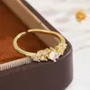Novo anel de trigo de zircônia cúbica com corte marquise de camada dupla transfronteiriço, cor dourada, luxo leve, brilhante, conjunto de anel aberto ajustável para mulheres