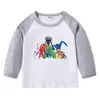 Camiseta infantil de primavera y otoño 2023, nueva camiseta de manga larga con cuello redondo y dibujos animados, camiseta de algodón para bebés y niños.