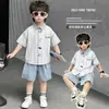 Traje de Verano para Niños 2026 Estilo Nuevo Conjunto de Dos Piezas de Camisa de Manga Corta de Verano para Niños Ropa de Verano para Bebé Rayas Dibujos Animados
