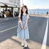 Vestido de Niña Verano 2026 Nuevo Único y Hermoso Blanco Manga Corta en Capas Mariposa Top sin Mangas Conjunto de Vestido para Niños