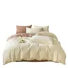 Juego de ropa de cama de cuatro piezas de algodón cepillado de color sólido estilo minimalista, funda de edredón de algodón puro, sábana, juego de ropa de cama de tres piezas para dormitorio