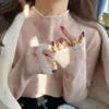 Camiseta base de punto gris para mujer, nuevo top popular de alta gama para otoño e invierno, suéter de cuello medio alto