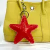 Patrón de grietas de hielo transfronterizo cuero estrella de cinco puntas muñeca colgante corazón de melocotón diy accesorios de joyería materiales llavero con corazón ins