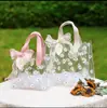 Bolso de PVC bolsa de plástico transparente bolsa de mano para regalo bolsa de regalo para dulces bolsa de regalo láser de fábrica venta al por mayor transfronteriza