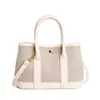 Bolso de jardín de temperamento moderno y elegante de nicho, bolso de mano versátil simple personalizado, bolso cruzado elegante para el día a día del viajero
