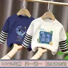 Camiseta de manga larga de dos piezas de imitación para niño, nuevo estilo primavera y otoño 2026, camiseta básica para niños talla mediana y grande, atuendo de otoño con top de retazos a rayas