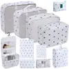 Set organizador de viaje premium, incluye 11 piezas: bolsas para guardar ropa, bolsas con cordón, bolsas para cosméticos y artículos de tocador, y bolsas de malla plegables para almacenamiento