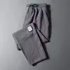 Pantalones Casuales de Lino Delgado de Seda Helada Nuevos de Verano para Hombre, Pierna Recta con Etiqueta, Estilo Coreano, Corte Holgado, Talla Grande, Pantalones Deportivos Acortados