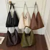 Bolso de hombro retro de gran capacidad para mujer, nuevo modelo 2026, patrón de tejido simple, bolso de hombro moderno, bolsa de mano de moda