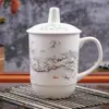 Taza de Té de Jingdezhen Cerámica Creativa Taza de Agua con Tapa Taza para Conferencias de Oficina Taza de Porcelana Fina Taza para Beber Porcelana Blanca Estampada