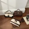Bolsa de mão color blocking de nicho estilo coreano para mulheres, nova tendência 2026 moda luxo leve bolsa pequena quadrada de ombro e transversal