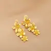 Pendientes de clip para mujer, flor exagerada retro europea y americana, sin agujero para la oreja, borla de flor de metal larga antigua, venta al por mayor