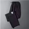 Pantalones Casuales de Lino Delgado de Seda Helada Nuevos de Verano para Hombre, Pierna Recta con Etiqueta, Estilo Coreano, Corte Holgado, Talla Grande, Pantalones Deportivos Acortados